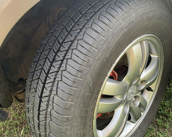 Сірий Хендай Туксон, об'ємом двигуна 1.98 л та пробігом 227 тис. км за 7500 $, фото 8 на Automoto.ua