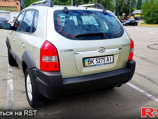 Серый Хендай Туксон, объемом двигателя 2 л и пробегом 249 тыс. км за 7300 $, фото 1 на Automoto.ua