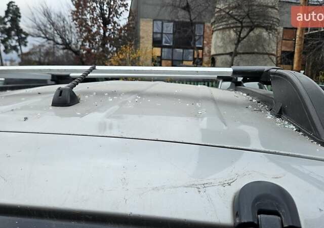 Серый Хендай Туксон, объемом двигателя 2 л и пробегом 330 тыс. км за 4000 $, фото 15 на Automoto.ua