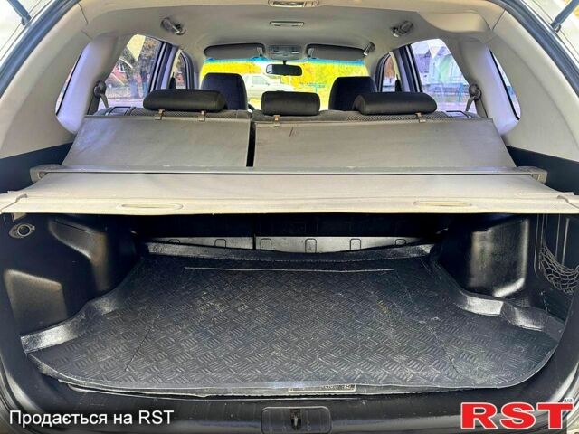 Сірий Хендай Туксон, об'ємом двигуна 2 л та пробігом 316 тис. км за 6780 $, фото 7 на Automoto.ua