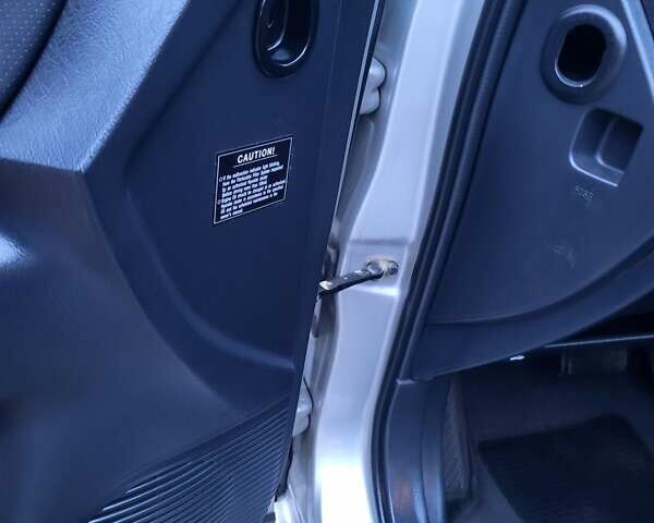 Серый Хендай Туксон, объемом двигателя 2 л и пробегом 240 тыс. км за 8300 $, фото 144 на Automoto.ua