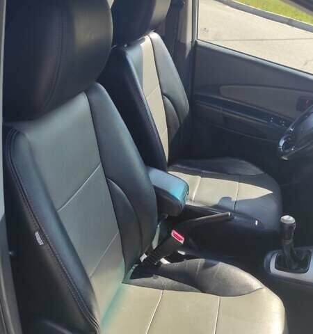 Серый Хендай Туксон, объемом двигателя 2 л и пробегом 185 тыс. км за 7999 $, фото 15 на Automoto.ua