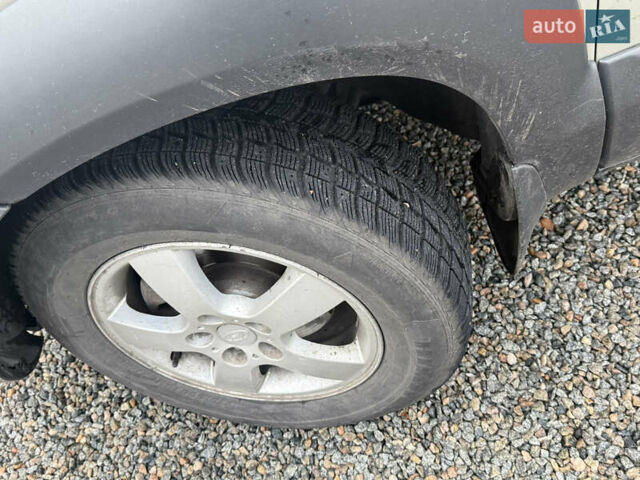 Сірий Хендай Туксон, об'ємом двигуна 1.98 л та пробігом 169 тис. км за 7890 $, фото 26 на Automoto.ua