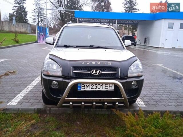 Сірий Хендай Туксон, об'ємом двигуна 1.98 л та пробігом 157 тис. км за 7800 $, фото 1 на Automoto.ua