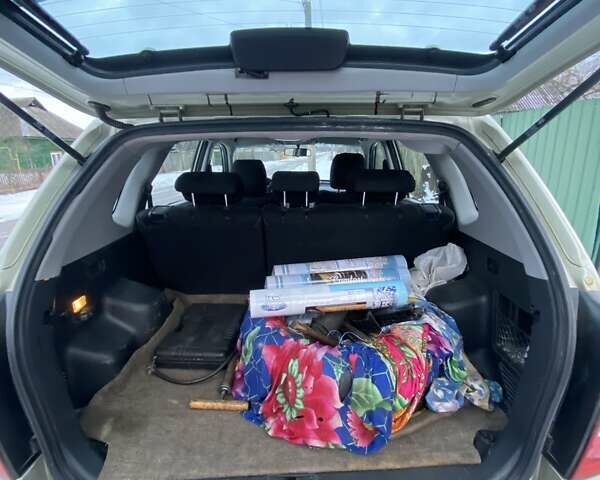 Серый Хендай Туксон, объемом двигателя 2 л и пробегом 213 тыс. км за 7999 $, фото 8 на Automoto.ua