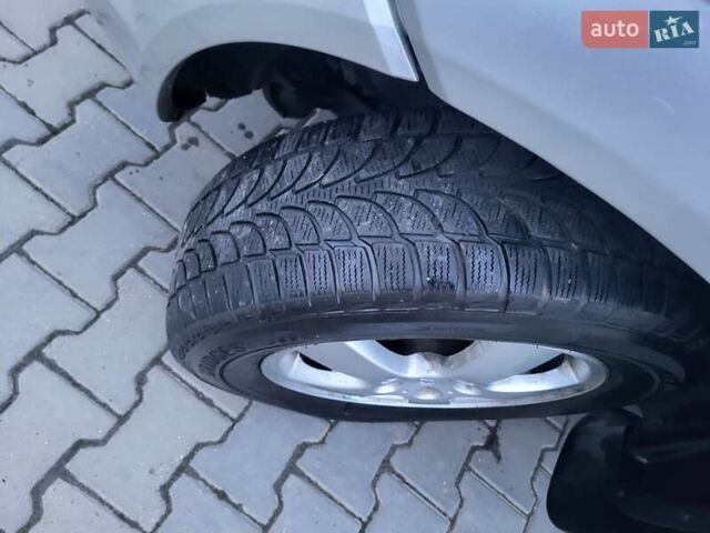 Серый Хендай Туксон, объемом двигателя 2 л и пробегом 240 тыс. км за 8300 $, фото 154 на Automoto.ua