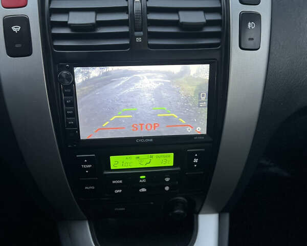 Сірий Хендай Туксон, об'ємом двигуна 2 л та пробігом 223 тис. км за 8500 $, фото 11 на Automoto.ua