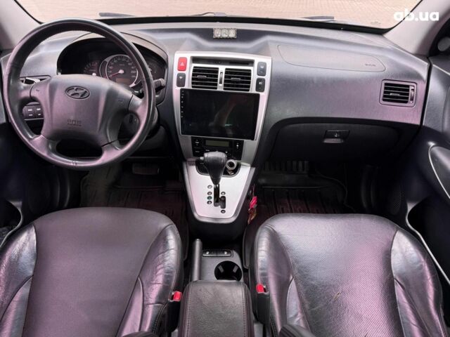 Серый Хендай Туксон, объемом двигателя 2 л и пробегом 214 тыс. км за 7990 $, фото 12 на Automoto.ua
