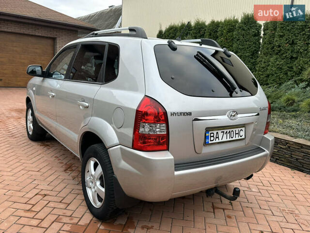 Серый Хендай Туксон, объемом двигателя 1.98 л и пробегом 217 тыс. км за 8500 $, фото 7 на Automoto.ua