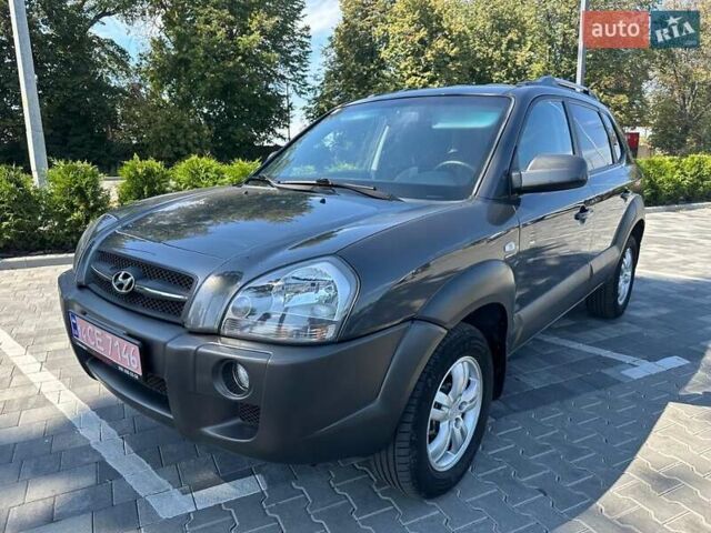 Серый Хендай Туксон, объемом двигателя 1.98 л и пробегом 169 тыс. км за 7900 $, фото 7 на Automoto.ua
