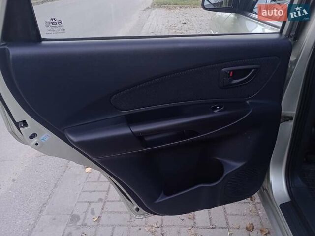 Сірий Хендай Туксон, об'ємом двигуна 1.98 л та пробігом 225 тис. км за 6999 $, фото 43 на Automoto.ua