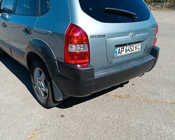 Сірий Хендай Туксон, об'ємом двигуна 1.98 л та пробігом 235 тис. км за 7500 $, фото 3 на Automoto.ua