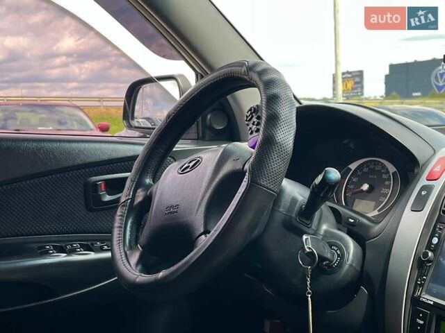 Серый Хендай Туксон, объемом двигателя 2 л и пробегом 255 тыс. км за 7490 $, фото 13 на Automoto.ua