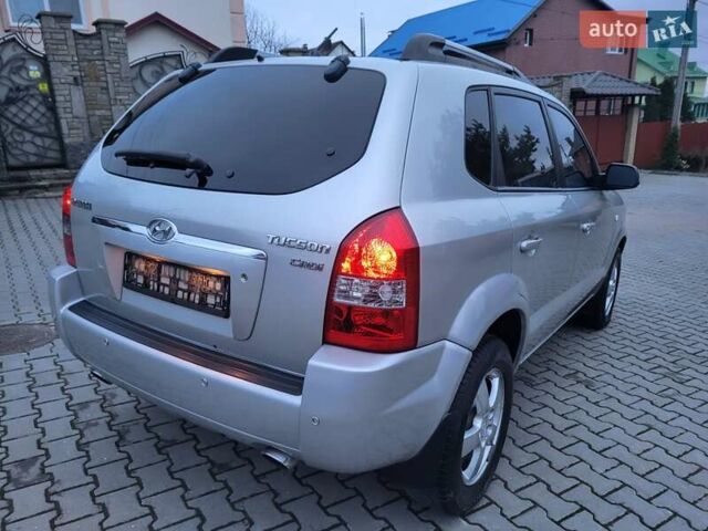 Серый Хендай Туксон, объемом двигателя 2 л и пробегом 240 тыс. км за 8300 $, фото 11 на Automoto.ua