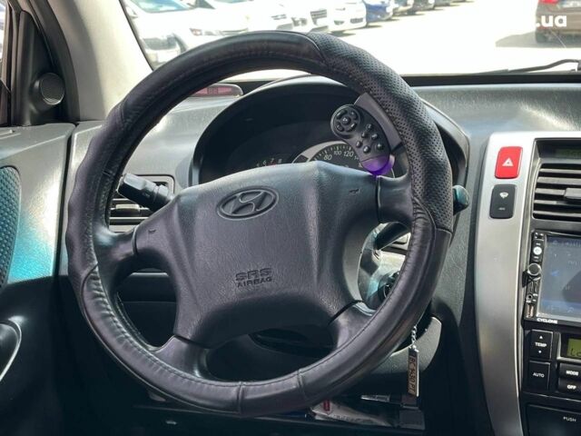 Серый Хендай Туксон, объемом двигателя 2 л и пробегом 255 тыс. км за 7490 $, фото 22 на Automoto.ua