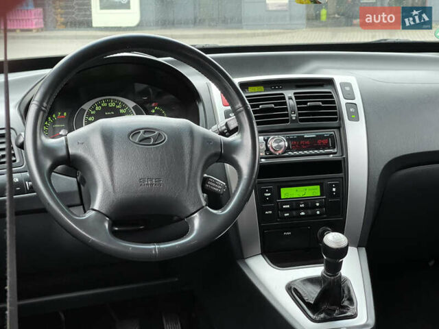 Серый Хендай Туксон, объемом двигателя 2 л и пробегом 182 тыс. км за 7600 $, фото 20 на Automoto.ua