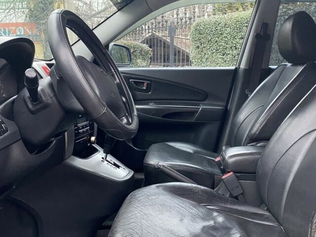 Сірий Хендай Туксон, об'ємом двигуна 2 л та пробігом 200 тис. км за 7500 $, фото 5 на Automoto.ua