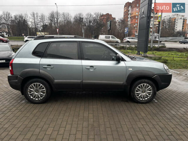 Сірий Хендай Туксон, об'ємом двигуна 2 л та пробігом 255 тис. км за 7600 $, фото 10 на Automoto.ua