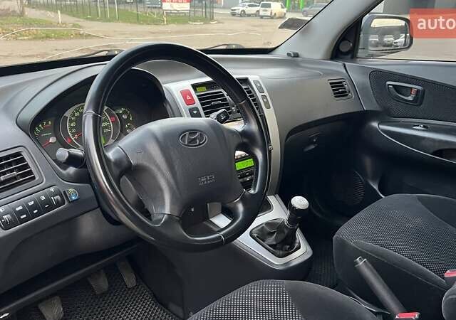 Сірий Хендай Туксон, об'ємом двигуна 1.98 л та пробігом 281 тис. км за 7200 $, фото 6 на Automoto.ua