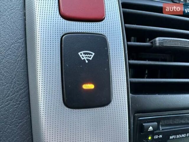 Серый Хендай Туксон, объемом двигателя 2 л и пробегом 110 тыс. км за 10200 $, фото 18 на Automoto.ua