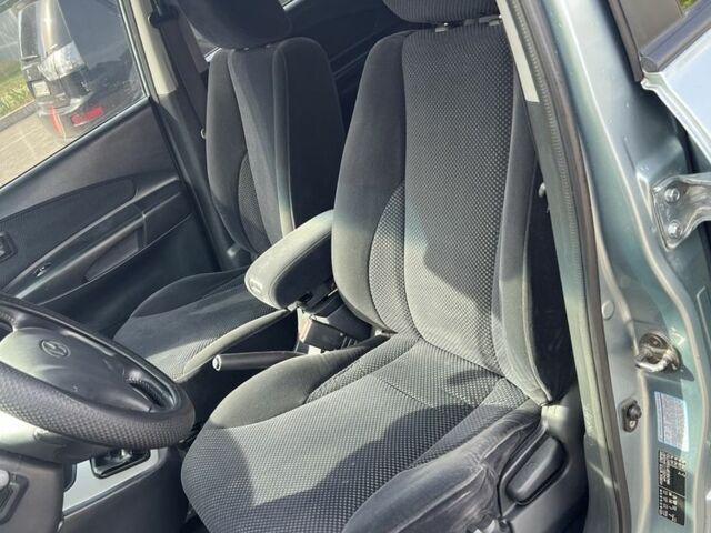 Сірий Хендай Туксон, об'ємом двигуна 2 л та пробігом 170 тис. км за 8700 $, фото 10 на Automoto.ua