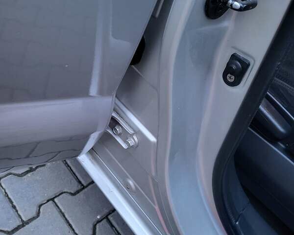 Серый Хендай Туксон, объемом двигателя 2 л и пробегом 240 тыс. км за 8300 $, фото 105 на Automoto.ua