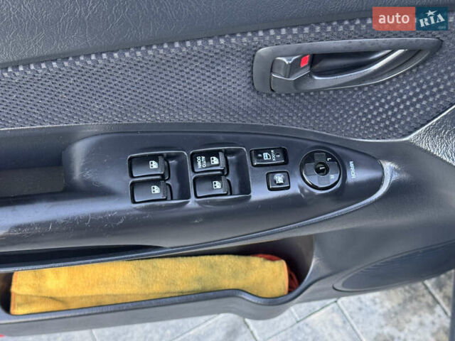 Серый Хендай Туксон, объемом двигателя 1.99 л и пробегом 315 тыс. км за 7300 $, фото 14 на Automoto.ua
