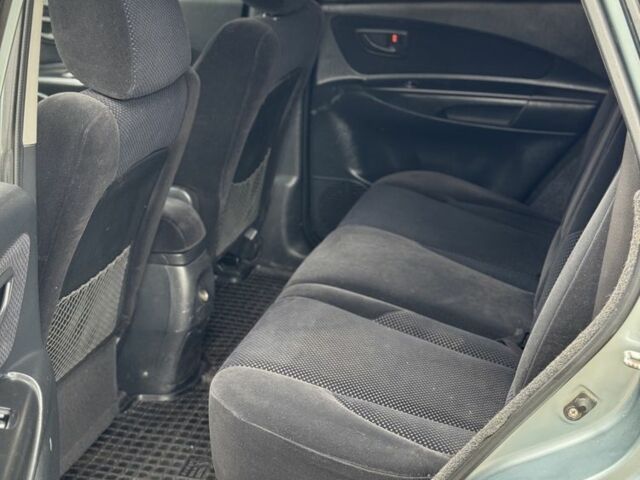 Серый Хендай Туксон, объемом двигателя 2 л и пробегом 159 тыс. км за 7299 $, фото 15 на Automoto.ua