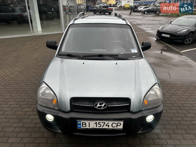 Сірий Хендай Туксон, об'ємом двигуна 2 л та пробігом 255 тис. км за 7600 $, фото 12 на Automoto.ua