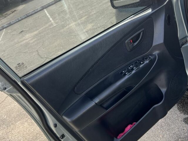 Сірий Хендай Туксон, об'ємом двигуна 2 л та пробігом 170 тис. км за 8700 $, фото 8 на Automoto.ua