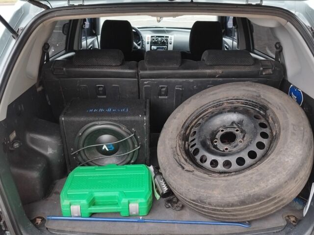 Серый Хендай Туксон, объемом двигателя 2 л и пробегом 2 тыс. км за 6800 $, фото 10 на Automoto.ua