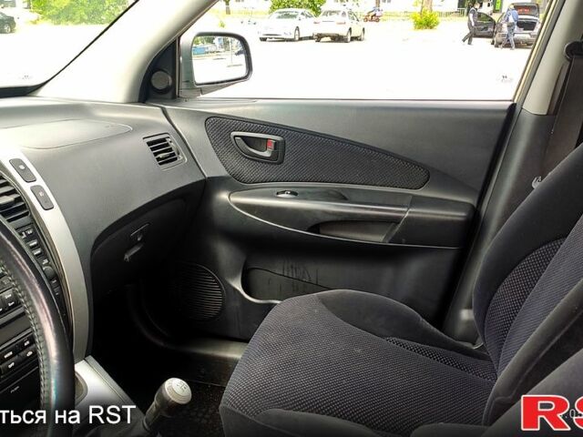 Серый Хендай Туксон, объемом двигателя 2 л и пробегом 249 тыс. км за 7300 $, фото 9 на Automoto.ua