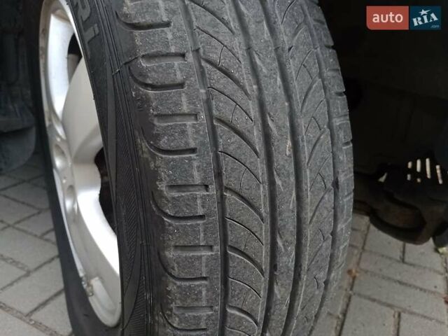 Сірий Хендай Туксон, об'ємом двигуна 1.98 л та пробігом 225 тис. км за 6999 $, фото 26 на Automoto.ua