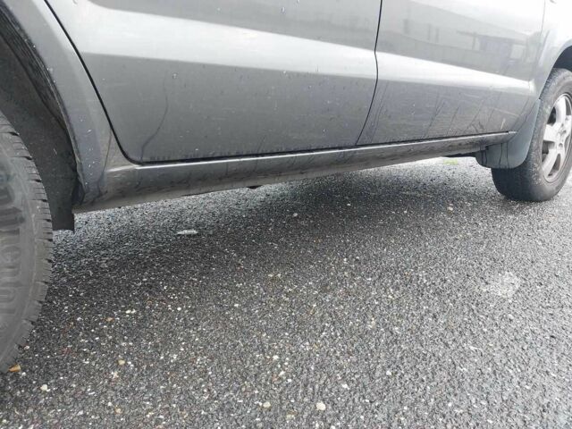 Серый Хендай Туксон, объемом двигателя 2 л и пробегом 245 тыс. км за 4112 $, фото 9 на Automoto.ua