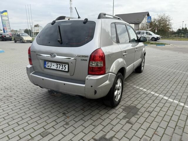 Серый Хендай Туксон, объемом двигателя 2 л и пробегом 175 тыс. км за 3400 $, фото 3 на Automoto.ua