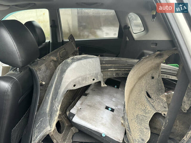 Серый Хендай Туксон, объемом двигателя 1.98 л и пробегом 340 тыс. км за 3999 $, фото 7 на Automoto.ua