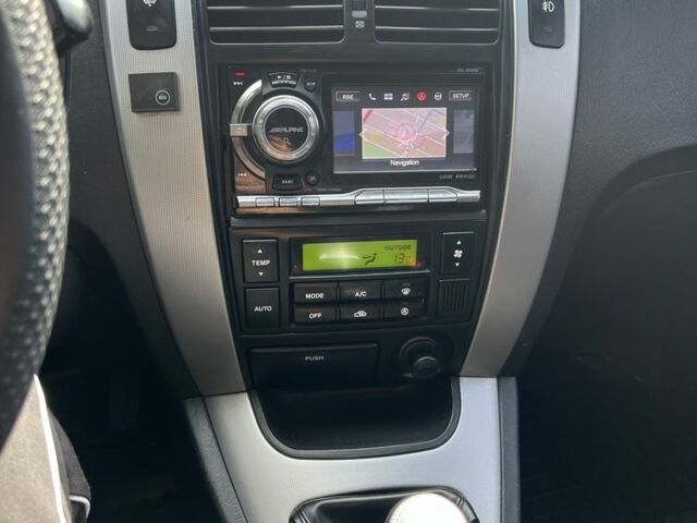 Сірий Хендай Туксон, об'ємом двигуна 2 л та пробігом 170 тис. км за 8700 $, фото 15 на Automoto.ua