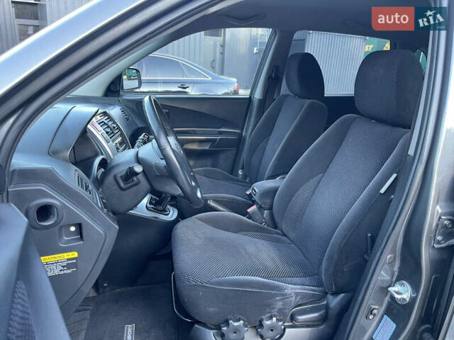 Серый Хендай Туксон, объемом двигателя 2 л и пробегом 182 тыс. км за 7600 $, фото 45 на Automoto.ua