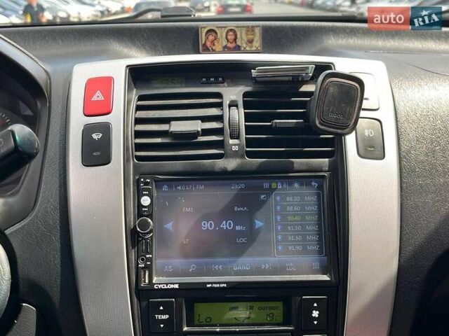 Серый Хендай Туксон, объемом двигателя 2 л и пробегом 255 тыс. км за 7490 $, фото 31 на Automoto.ua