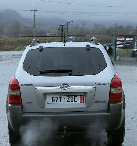 Серый Хендай Туксон, объемом двигателя 2 л и пробегом 222 тыс. км за 7950 $, фото 5 на Automoto.ua