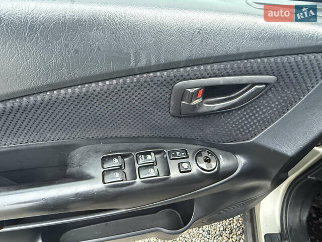Сірий Хендай Туксон, об'ємом двигуна 1.98 л та пробігом 169 тис. км за 7890 $, фото 19 на Automoto.ua