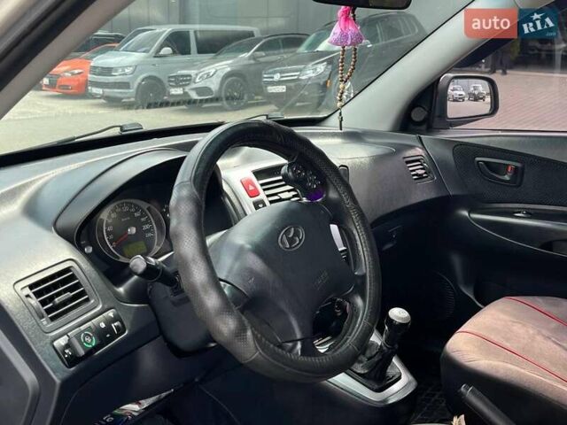 Серый Хендай Туксон, объемом двигателя 2 л и пробегом 255 тыс. км за 7490 $, фото 37 на Automoto.ua