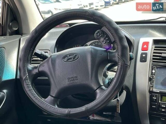 Серый Хендай Туксон, объемом двигателя 2 л и пробегом 255 тыс. км за 7490 $, фото 22 на Automoto.ua