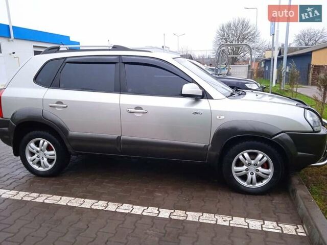 Сірий Хендай Туксон, об'ємом двигуна 1.98 л та пробігом 157 тис. км за 7800 $, фото 5 на Automoto.ua