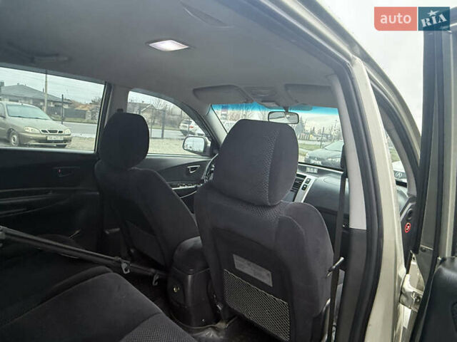 Сірий Хендай Туксон, об'ємом двигуна 1.98 л та пробігом 169 тис. км за 7890 $, фото 14 на Automoto.ua