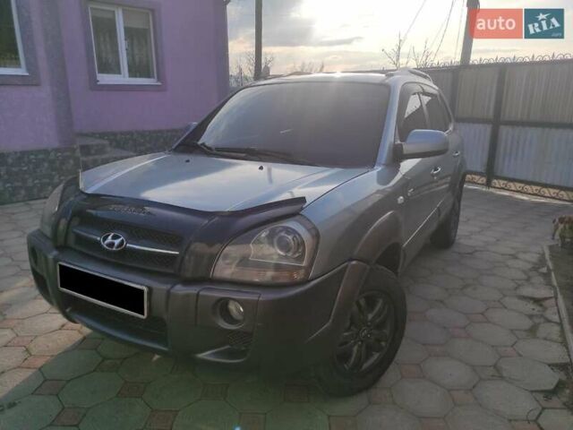 Серый Хендай Туксон, объемом двигателя 1.98 л и пробегом 187 тыс. км за 7800 $, фото 10 на Automoto.ua