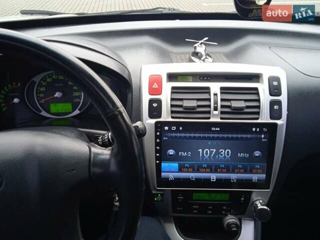 Сірий Хендай Туксон, об'ємом двигуна 1.98 л та пробігом 157 тис. км за 7800 $, фото 23 на Automoto.ua