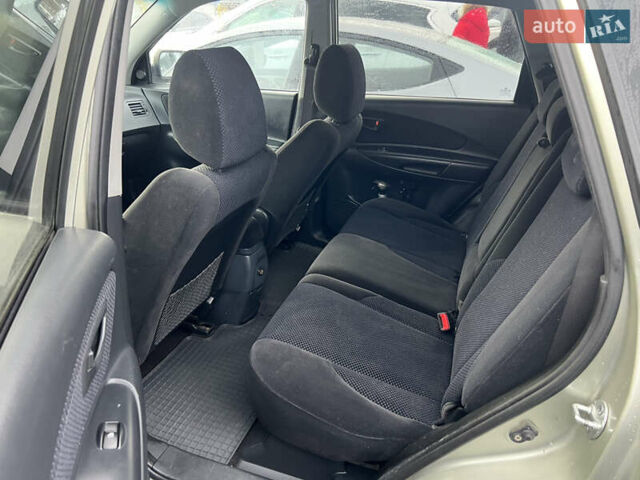 Сірий Хендай Туксон, об'ємом двигуна 2 л та пробігом 257 тис. км за 6550 $, фото 21 на Automoto.ua