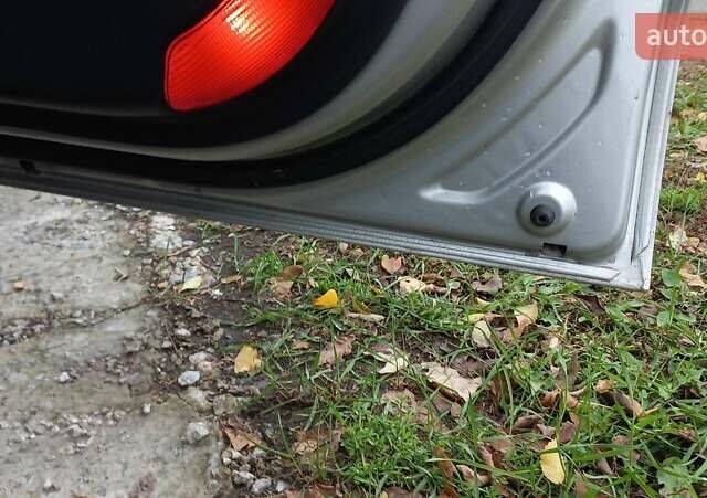 Сірий Хендай Туксон, об'ємом двигуна 2 л та пробігом 203 тис. км за 7700 $, фото 21 на Automoto.ua