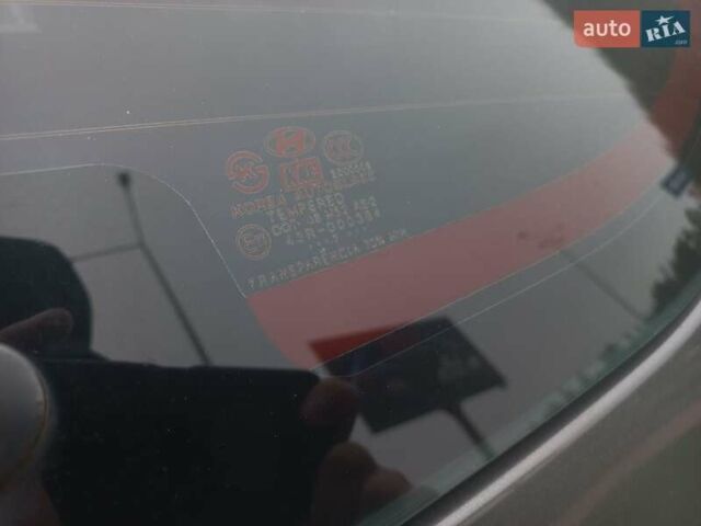 Сірий Хендай Туксон, об'ємом двигуна 2 л та пробігом 190 тис. км за 8600 $, фото 35 на Automoto.ua